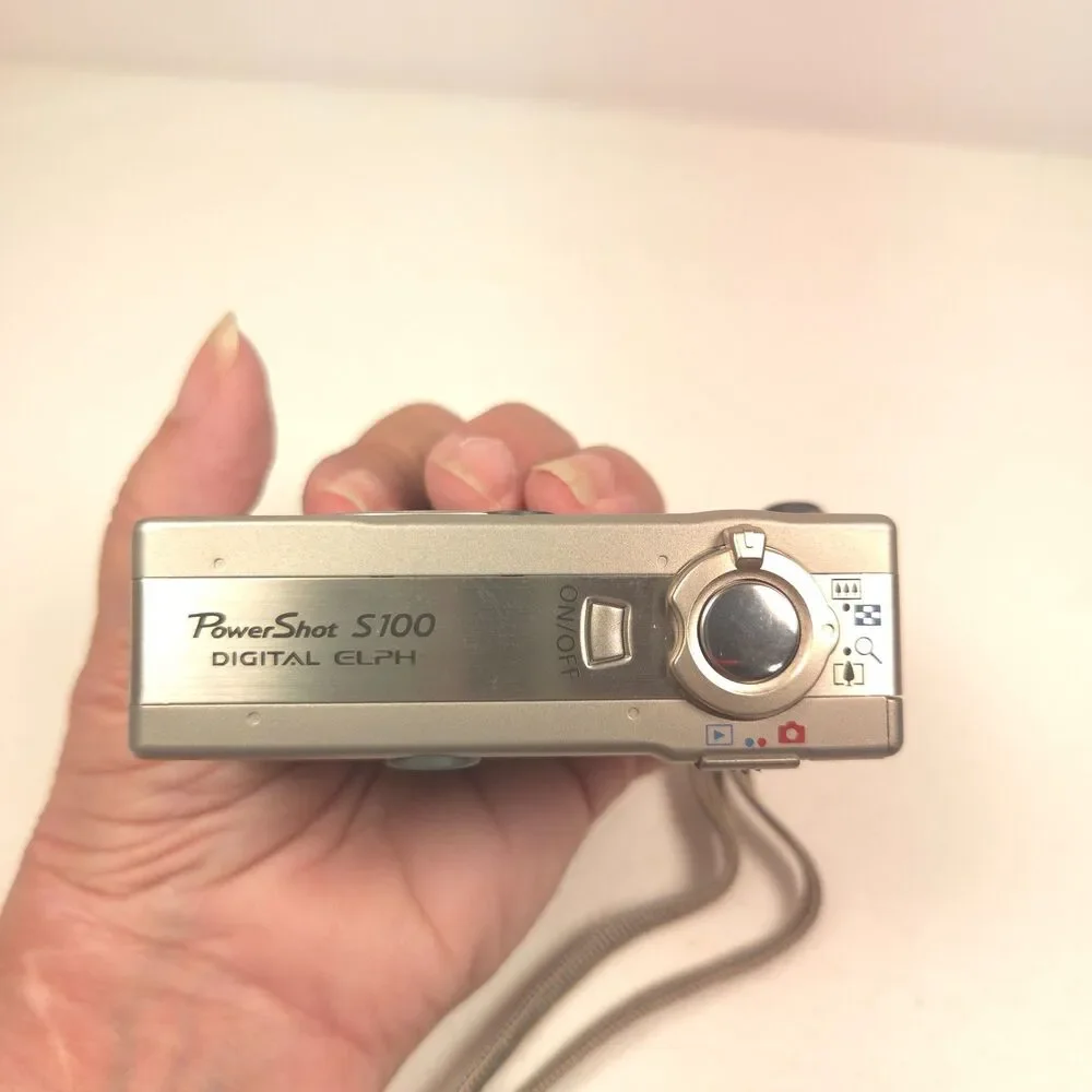 Canon PowerShot S100 Digital ELPH Camera Bundle Case Flash Battery Tested